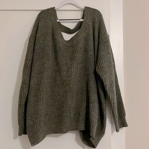 Sage green sweater scoop neck front. Plunging V back with Knotted detail.